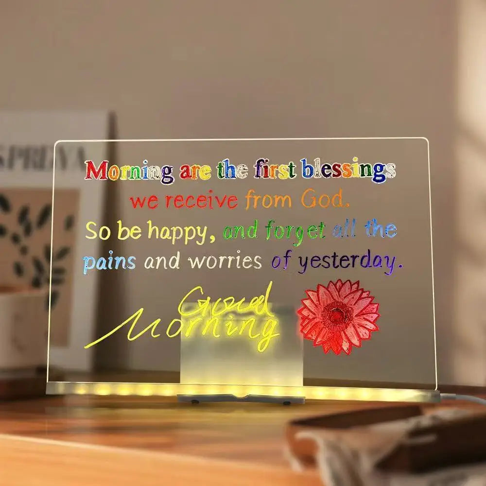 GlowBoard LED note board on a desk showing a colourful good-morning message