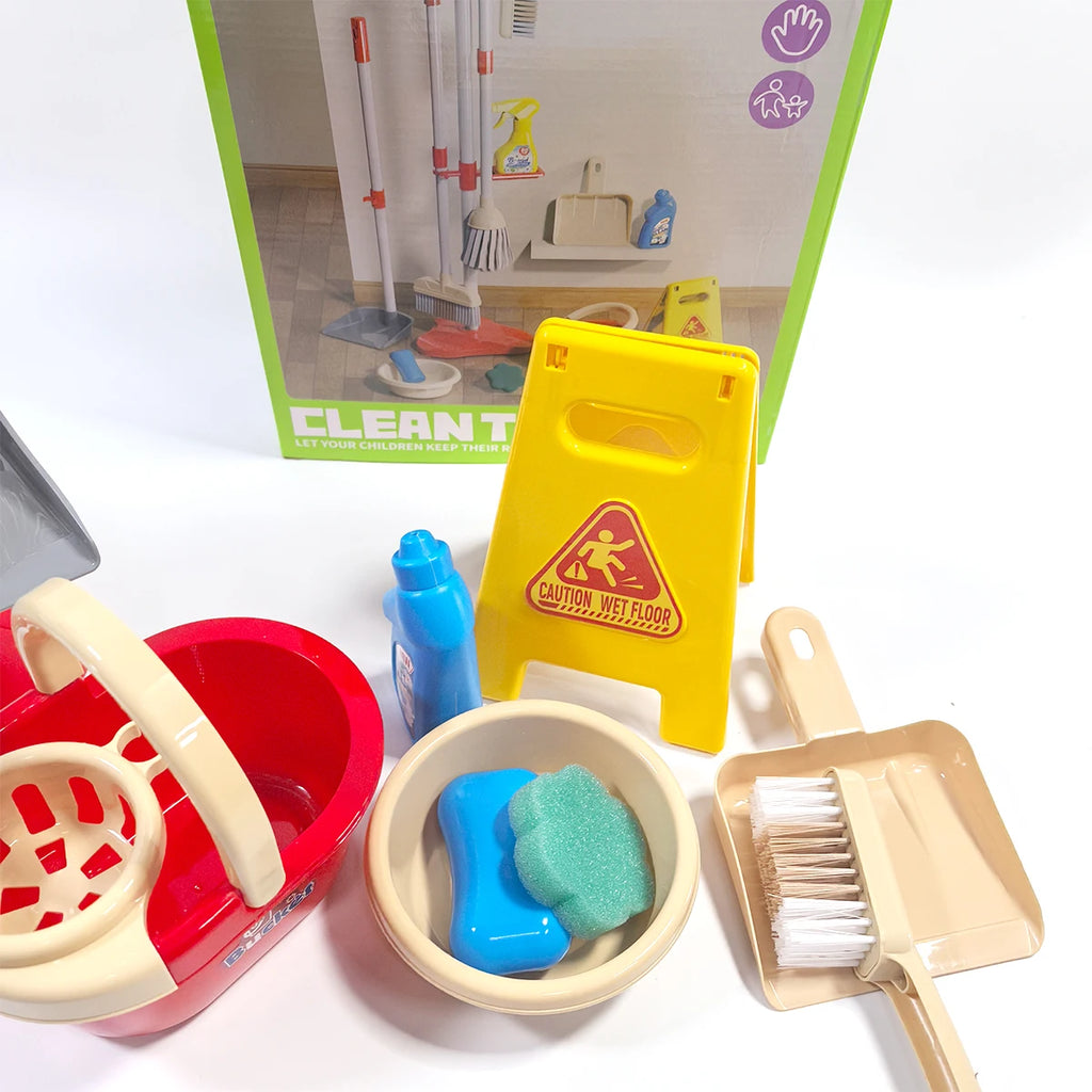 TidyTots pieces unboxed: toy mop bucket, basin, caution sign, hand brush and dustpan