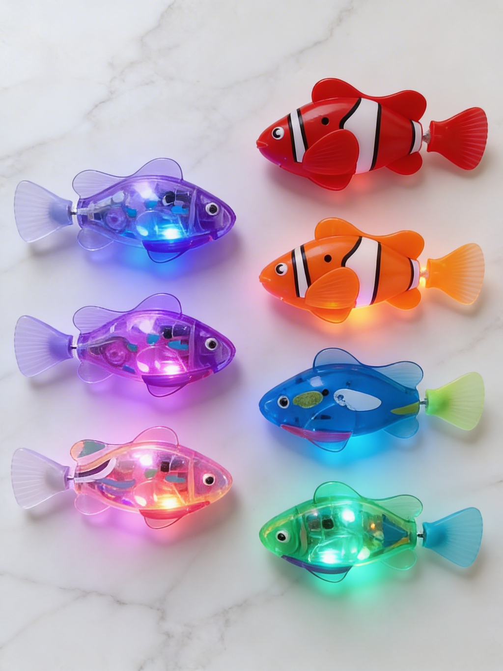 Six AquaPet fish colour designs laid out with LED lights on