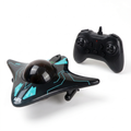 AquaSpy RC submarine in Stealth Black with its remote controller on a white background